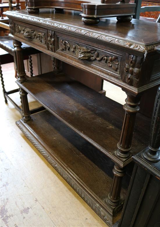 Flemish carved oak three tier buffet, with inset marble top